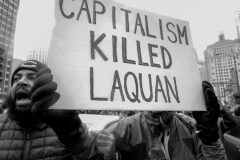 CHICAGO, IL. Nov. 27, 2015 – Demonstrators chant “Hey hey! Ho ho! Rahm Emmanuel has got to go” during a protest march down Chicago’s Magnificent Mile. The Black Friday protest was sparked off in response to the shooting death of Laquan McDonald by a Chicago Police office back in 2014.