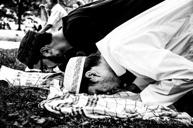 A group of Muslim protesters take a time-out for prayer outside the White House during the Palestinian National March, 2014.