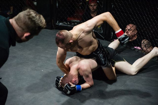 Luke Cherep (Top) pounds his opponent, Connor Savage, during Total Fight Challenge (TFC 135) title bout at the Willowbrook Ballroom in Willow Springs, IL.