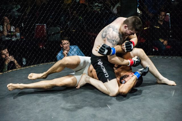 Ramiro Marquez dilivers punishment to his opponent, James Harrison, during TFC 135 at the Willowbrook Ballroom, Friday September 25, 2015. 