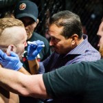 Safety first... Blaise Filas gets checked out by the house doctor during a match with Ivan Bivanco during TFC 135 Chicagoland area MMA, Friday September 25