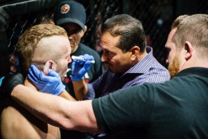 Safety first... Blaise Filas gets checked out by the house doctor during a match with Ivan Bivanco during TFC 135 Chicagoland area MMA, Friday September 25