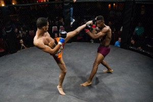 Eddie Lopez (Left) throws a kick to the head which is successfully blocked by Derrick Wick during TFC 135, Friday September 25, 2015.