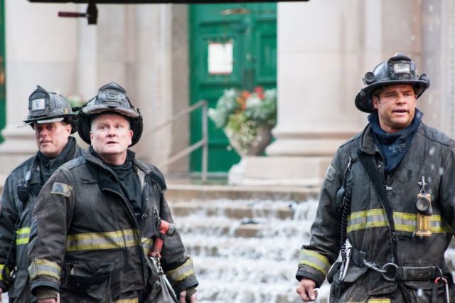 Water pours down the steps of the historic Shrine of Christ the King Catholic Church on October 7, 2015, as Chicago firefighters work to extinguish the blaze that devastated the 92 year-old church located on the 6400 block of Woodlawn Avenue.