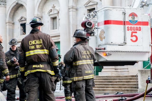 Chicago firefighters work to battle a blaze that broke out during the early morning hours at the historic Shrine of Christ the King Catholic Church in the 6400 block of Woodlawn Avenue, on October 7, 2015.