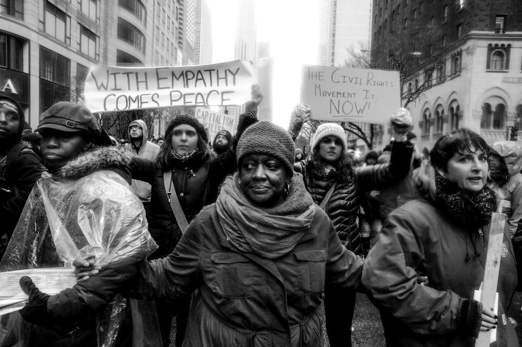 Chicago protesters march as police release video of officer shooting teen