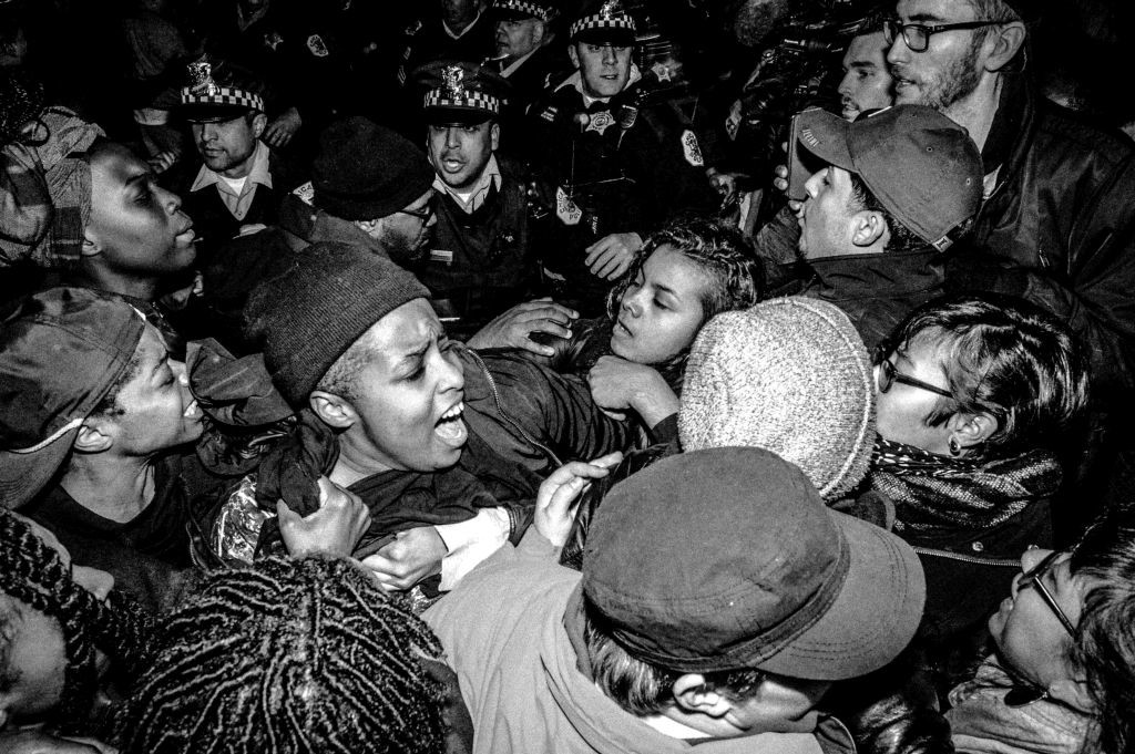Pandemonium erupts as ‪#‎Trump‬ protesters clash with police in ‪#‎Chicago‬. Donald J. Trump