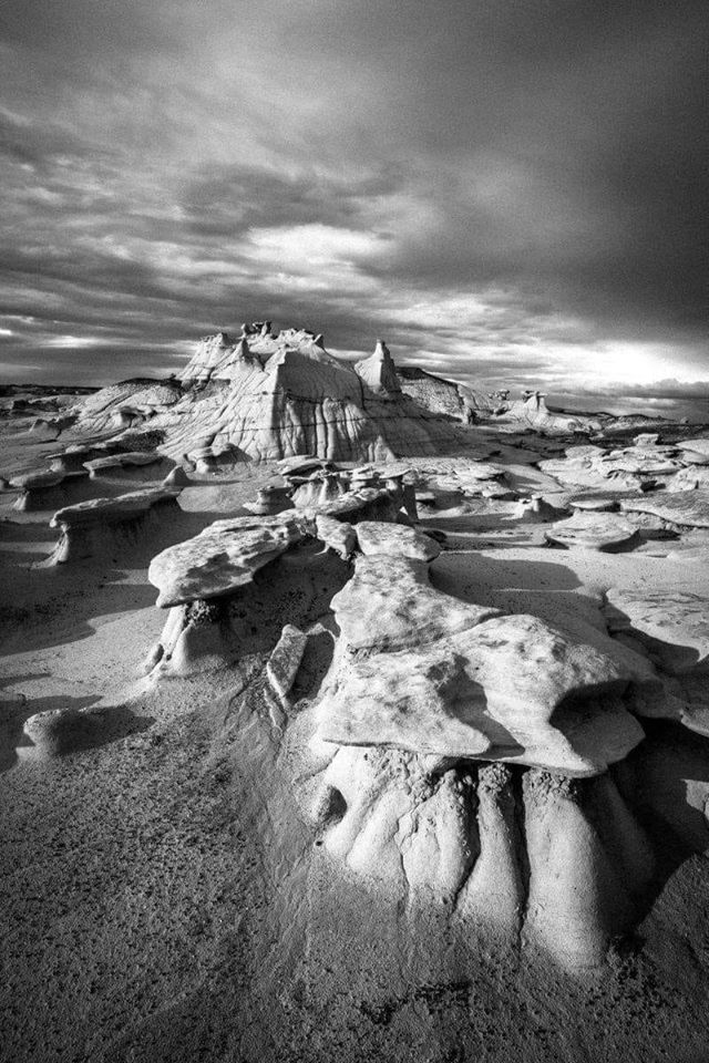 The Bisti Badlands, located in northwestern New Mexico, is recognized for its otherworldly landscapes colorful and photogenic expanse of undulating mounds and unusual eroded rocks in the San Juan Basin.